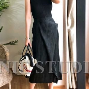 Black pleated asymmetric long midi skirt
